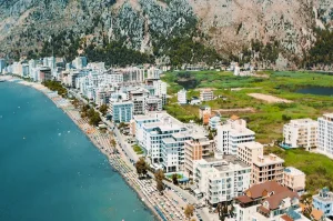 Shëngjin is a lively coastal town that offers a perfect blend of relaxation and adventure. The beach is well-known for its golden sand and clear, warm waters, making it an ideal spot for both swimming and sunbathing.